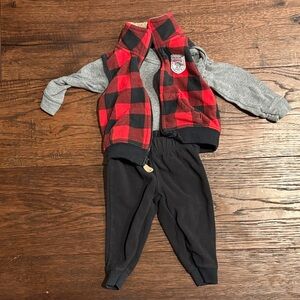 Red and Black Plaid Vest with Gray Onesie and Black Pants. 9 months
